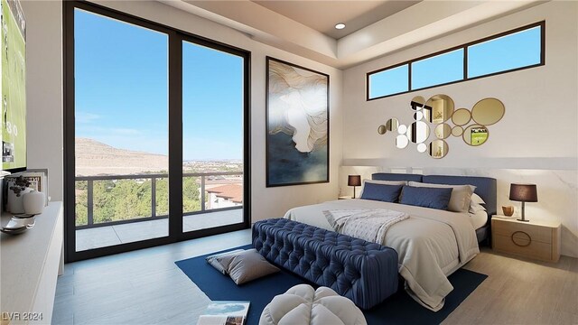 bedroom featuring access to exterior, light wood-type flooring, a mountain view, and multiple windows