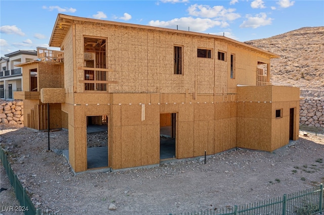 view of building exterior featuring a mountain view