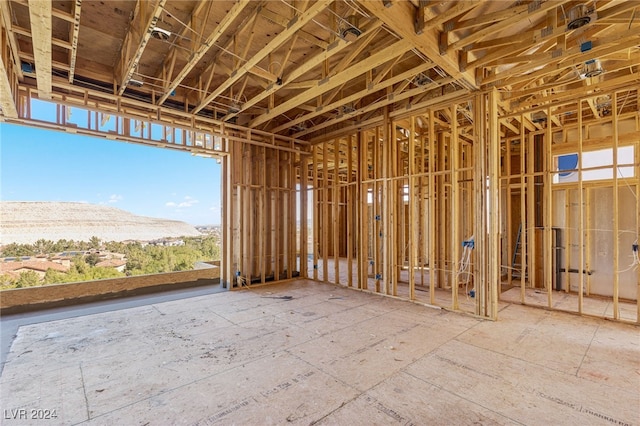 miscellaneous room featuring a mountain view