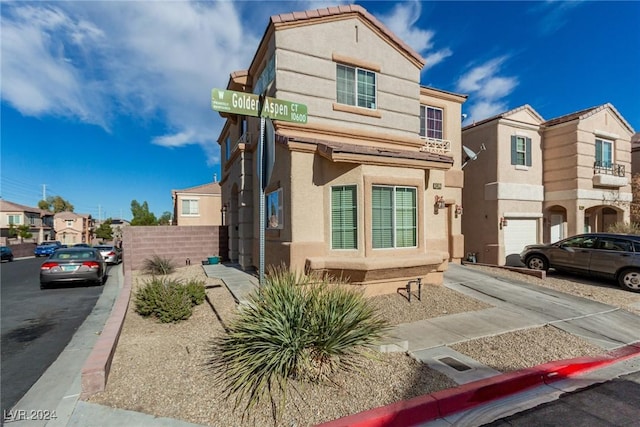 view of front of property with a garage