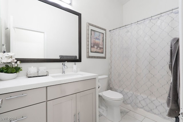 full bathroom featuring vanity, shower / tub combo, and toilet