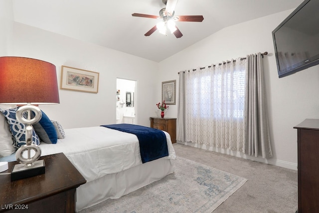 carpeted bedroom with vaulted ceiling and ceiling fan