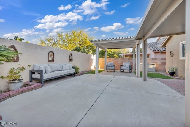 view of patio / terrace with an outdoor living space and a pergola