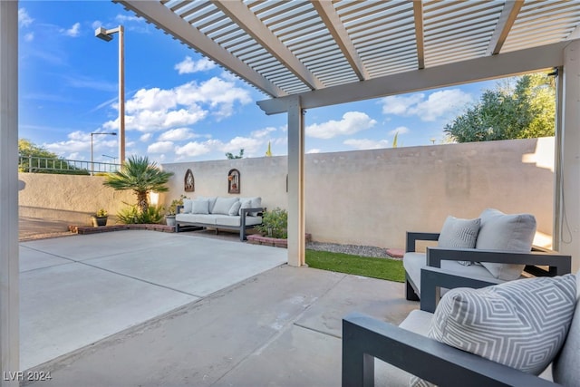 view of patio / terrace featuring an outdoor living space and a pergola