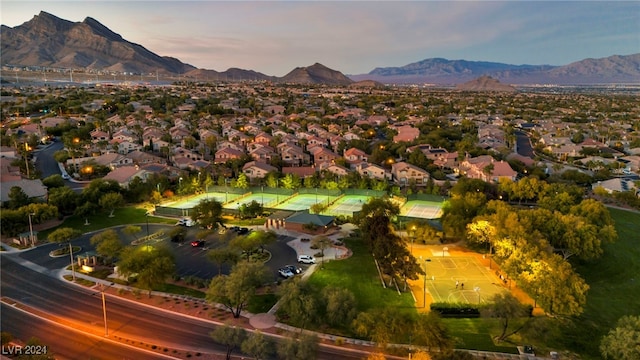 aerial view at dusk with a mountain view