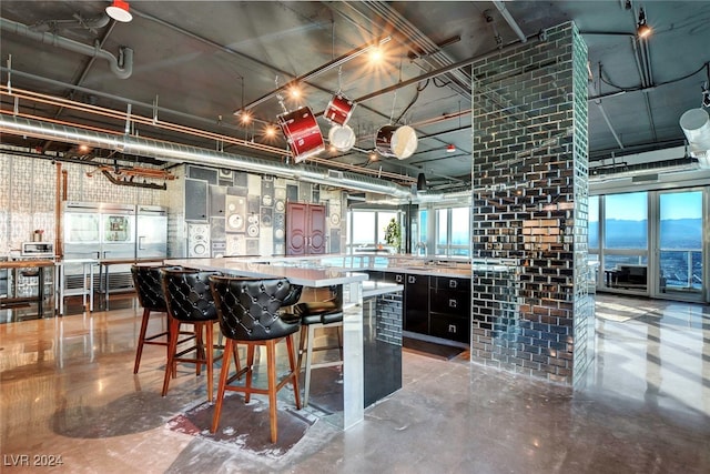 kitchen featuring concrete flooring