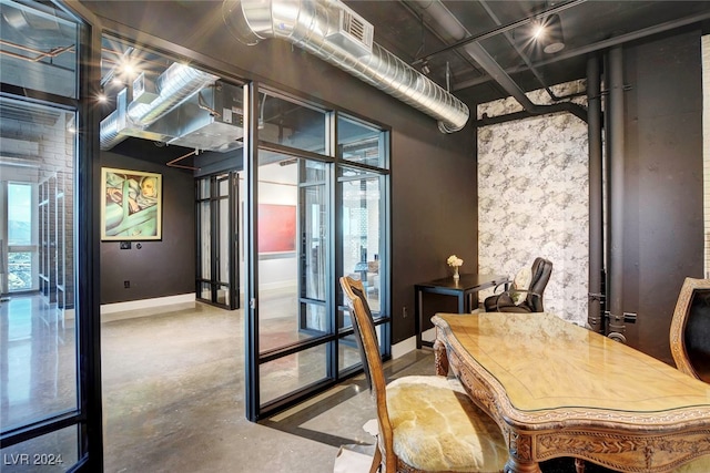 office space with concrete floors