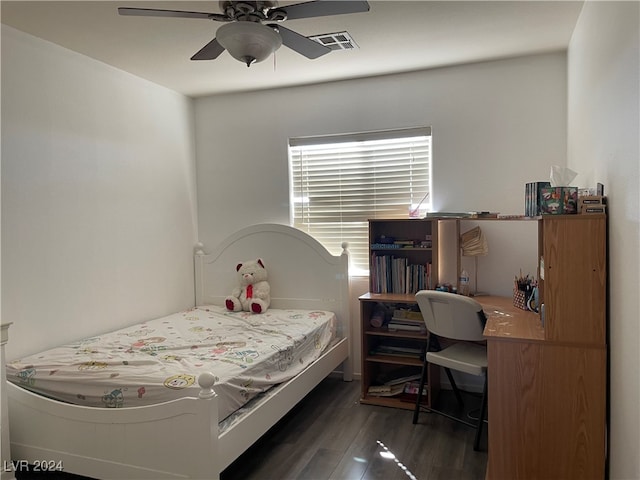 bedroom featuring ceiling fan and dark wood-type flooring