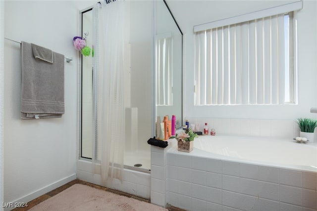 bathroom with plus walk in shower