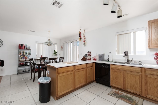 kitchen with kitchen peninsula, sink, light tile patterned floors, black dishwasher, and hanging light fixtures