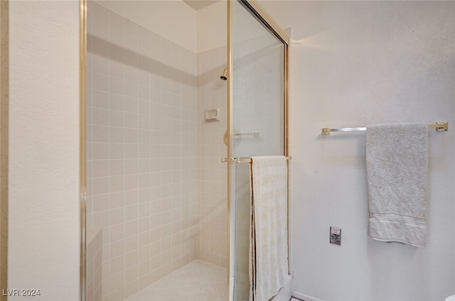 bathroom featuring walk in shower