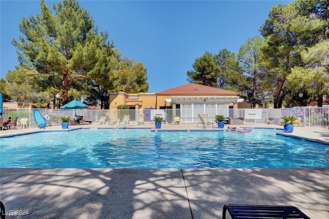 view of pool featuring a patio area