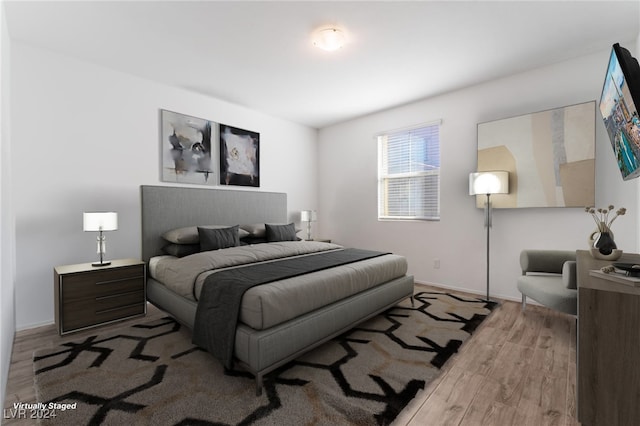 bedroom featuring light hardwood / wood-style flooring