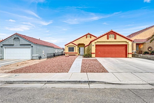 view of front of property with a garage