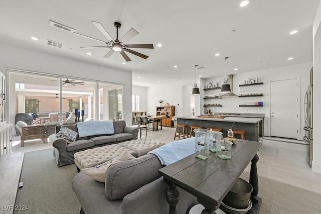 living room featuring ceiling fan