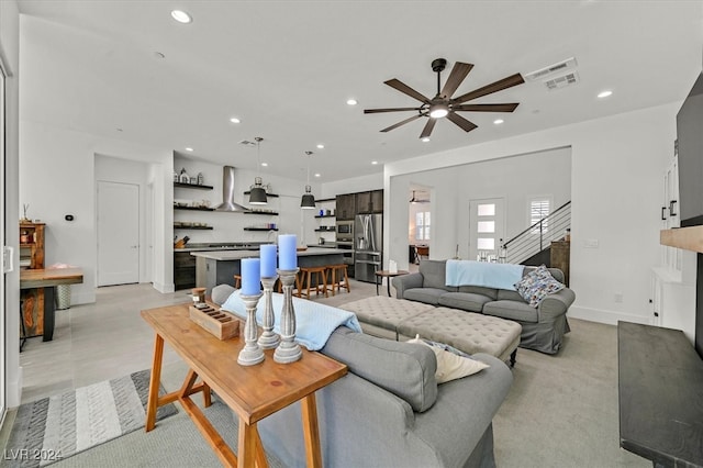 living room with ceiling fan