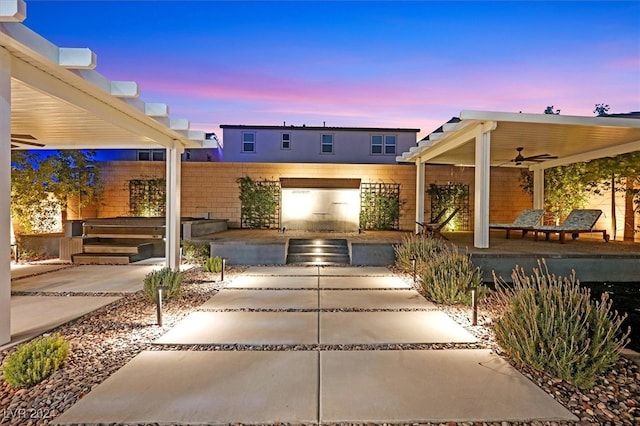 exterior space featuring a patio area and ceiling fan