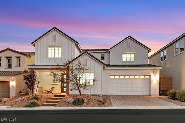 view of front of home with a garage