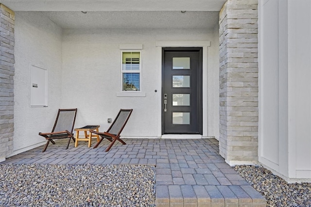 doorway to property with electric panel