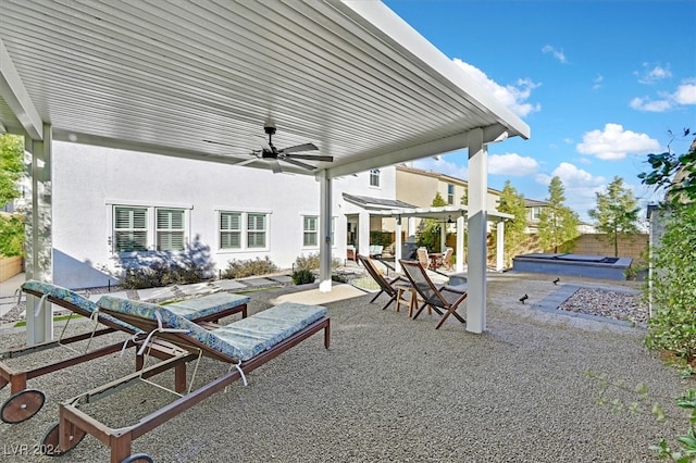 view of patio featuring ceiling fan