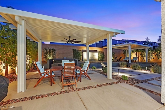 patio terrace at dusk with ceiling fan