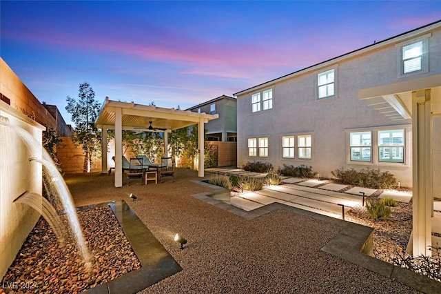 exterior space featuring ceiling fan, a patio, and an outdoor hangout area