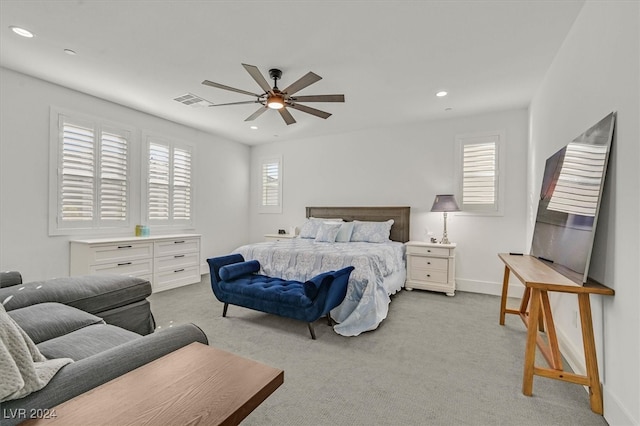 carpeted bedroom featuring ceiling fan