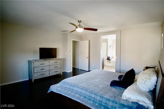 bedroom with ceiling fan and dark hardwood / wood-style flooring