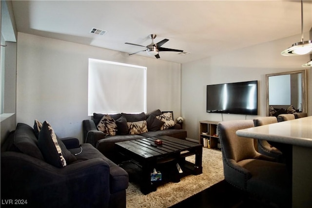 living room with ceiling fan