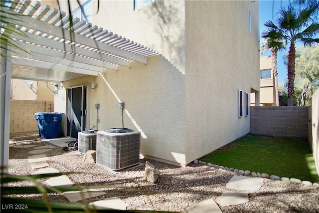 view of property exterior featuring central AC