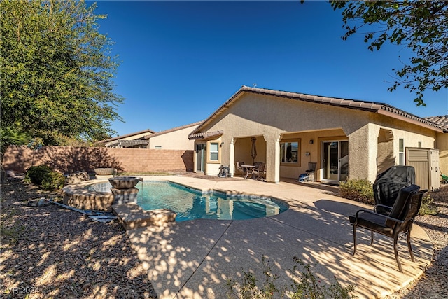 view of pool featuring a patio area