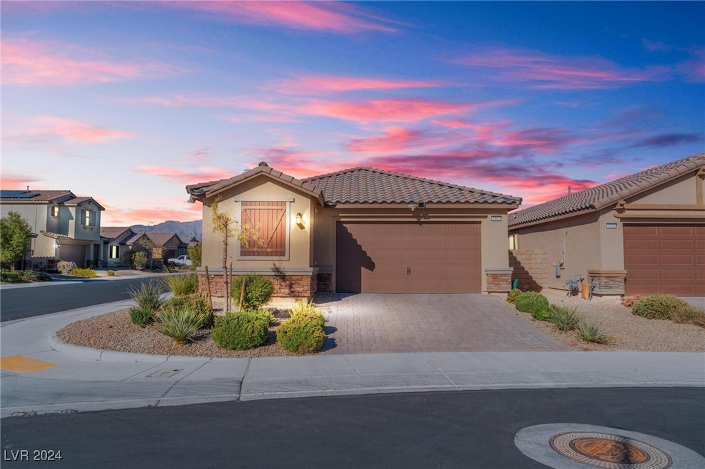 view of front of home with a garage