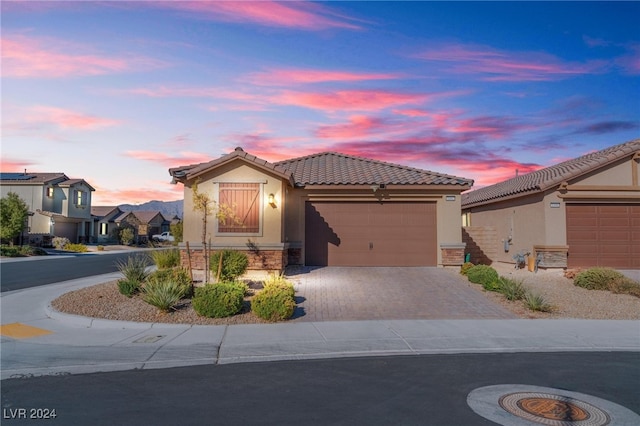 view of front of home with a garage