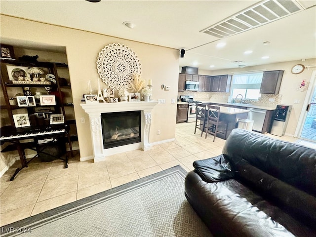 tiled living room with sink