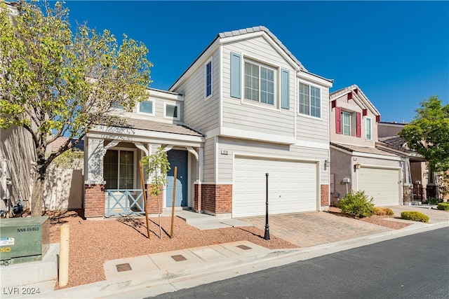 view of front of property with a garage