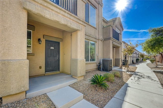 property entrance with central air condition unit