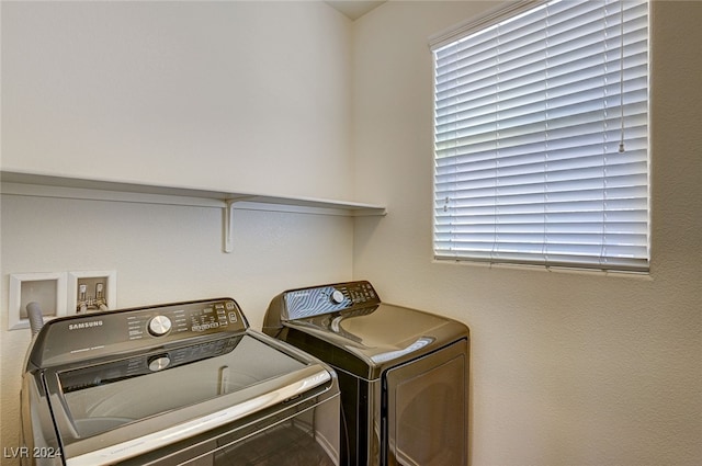 laundry room featuring washer and clothes dryer