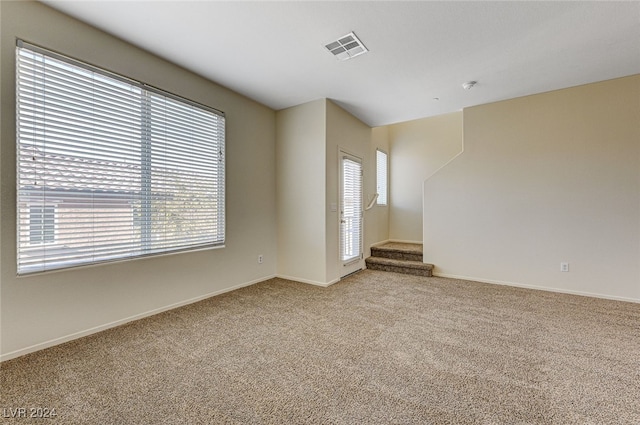 empty room with light carpet