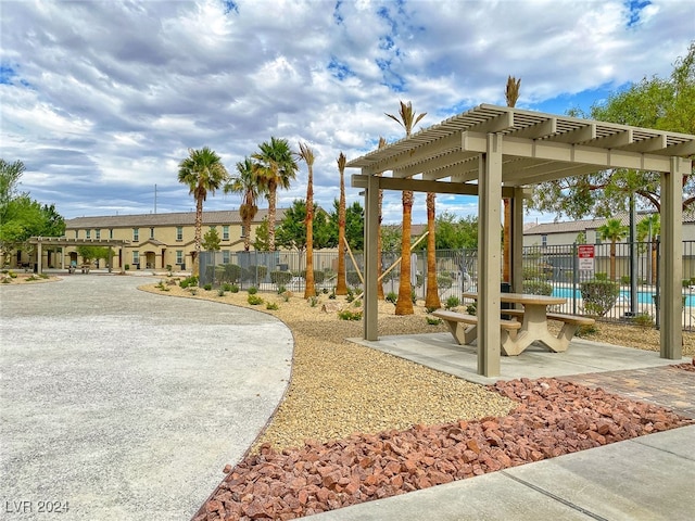 surrounding community featuring a pergola