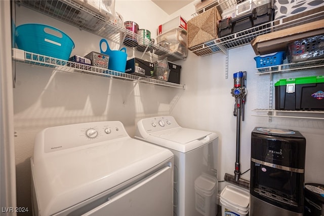 washroom with washer and clothes dryer