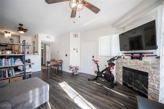 interior space featuring a fireplace and dark hardwood / wood-style floors