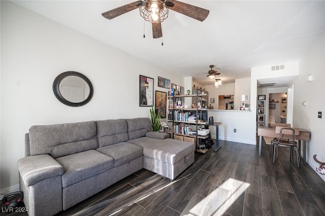 living room featuring dark wood-type flooring