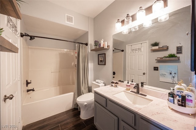 full bathroom featuring shower / bath combo, toilet, wood-type flooring, and vanity