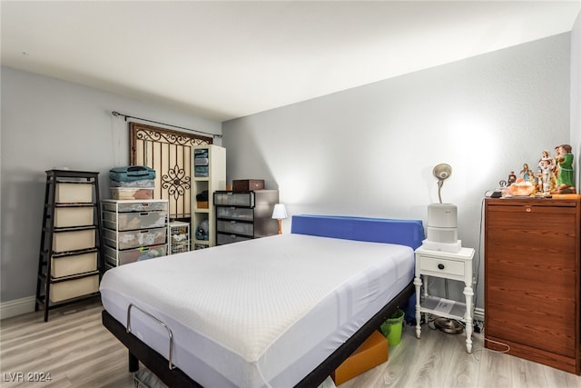 bedroom featuring light wood-type flooring