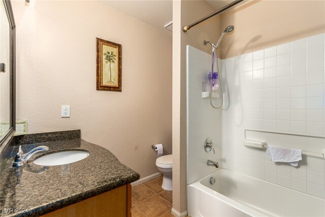 full bathroom featuring tile patterned flooring, vanity, shower / bathtub combination, and toilet