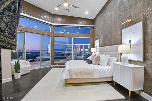 bedroom featuring access to outside and high vaulted ceiling