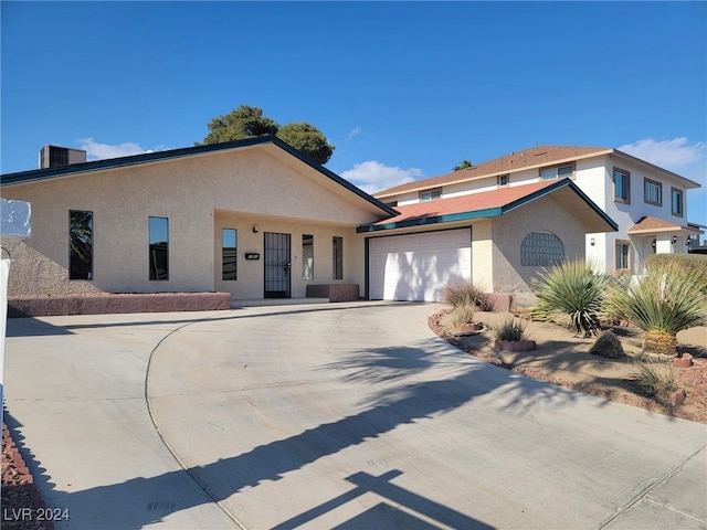 view of front of home with a garage