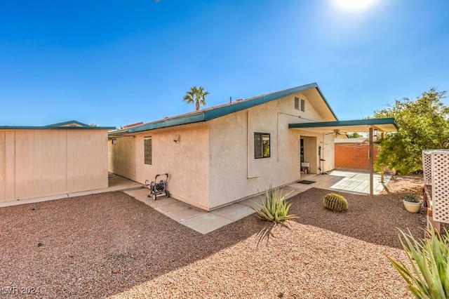 rear view of house with a patio area