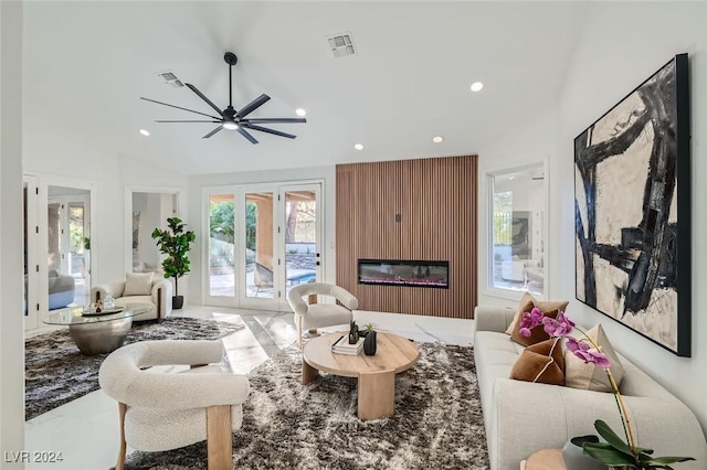 living room featuring french doors and ceiling fan