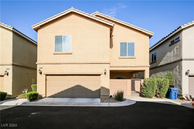 view of front of home featuring a garage